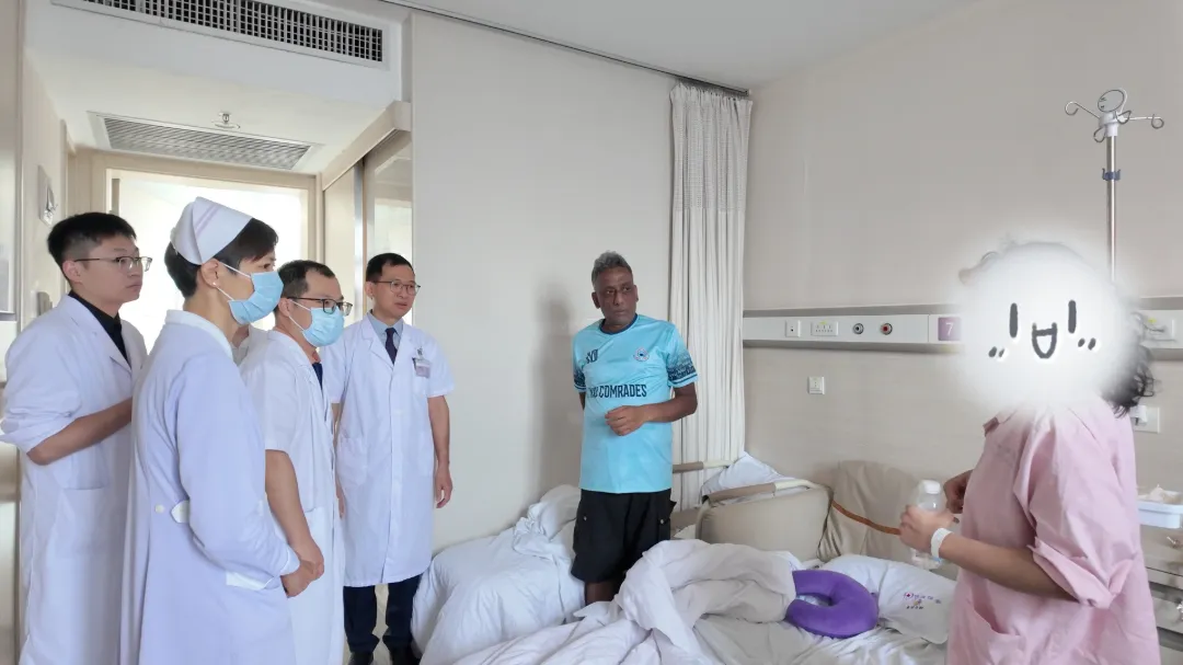 FIMC urology team visiting Bangladeshi patient Tina in hospital room